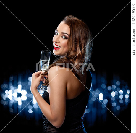 Portrait, woman and celebrity in fashion, champagne and dress for glamour, confident and elegant. Bokeh background, smile and movie star in party, night and clothes for celebration and networking Portrait, woman and celebrity in fashion, champagne and dress for glamour, confident and elegant. Bokeh background, smile and movie star in party, night and clothes for celebration and networking 142049558