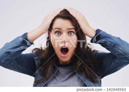 Woman, portrait and shock in studio for drama, gossip and wtf or omg for secret on white background. Female person, surprise and overwhelmed for news or info, worry and panic for rumor or confession Woman, portrait and shock in studio for drama, gossip and wtf or omg for secret on white background. Female person, surprise and overwhelmed for news or info, worry and panic for rumor or confession 142049563