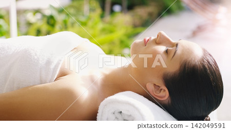 Beauty, salon and woman relax at spa for massage, facial treatment and luxury pamper. Aesthetic, dermatology and person rest on bed at resort for wellness, cosmetics service and skincare therapy Beauty, salon and woman relax at spa for massage, facial treatment and luxury pamper. Aesthetic, dermatology and person rest on bed at resort for wellness, cosmetics service and skincare therapy 142049591
