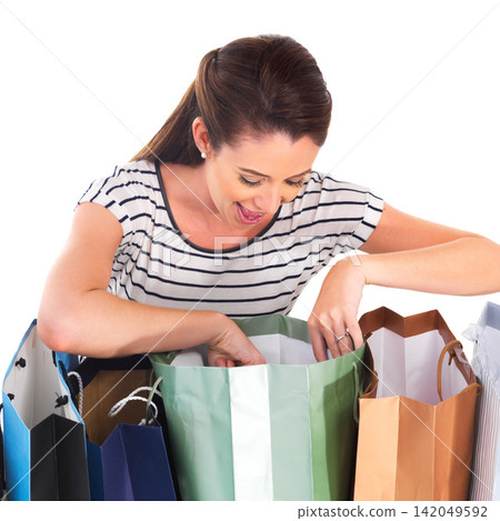 Bags, shopping and surprise with woman customer in studio isolated on white background for bargain or sale. Retail, store and wow with happy young consumer looking at product in package for discount Bags, shopping and surprise with woman customer in studio isolated on white background for bargain or sale. Retail, store and wow with happy young consumer looking at product in package for discount 142049592