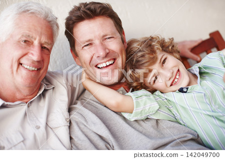 Portrait, hug and kid with father, grandfather and laughter in a house with care, trust and support. Happy family, bonding and man generations in living room for weekend, vacation or reunion at home Portrait, hug and kid with father, grandfather and laughter in a house with care, trust and support. Happy family, bonding and man generations in living room for weekend, vacation or reunion at home 142049700