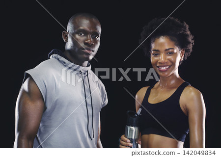 Black people, portrait and sports workout with personal trainer or sweating, dark background or athlete. Man, woman and face or training together for healthy confidence or gym, studio or teamwork Black people, portrait and sports workout with personal trainer or sweating, dark background or athlete. Man, woman and face or training together for healthy confidence or gym, studio or teamwork 142049834