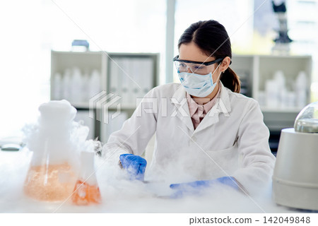 Woman, scientist and lab with chemical reaction in glass for research, study and scientific experiment. Biotechnology, innovation and medical tools with liquid or acid for discovery, test and smoke Woman, scientist and lab with chemical reaction in glass for research, study and scientific experiment. Biotechnology, innovation and medical tools with liquid or acid for discovery, test and smoke 142049848