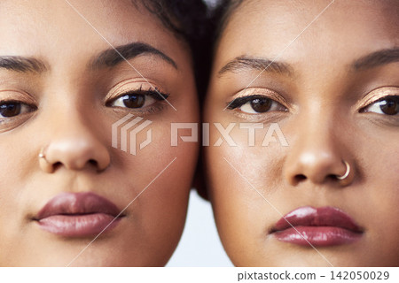 Portrait, face and woman with cosmetic in studio with piercing for beauty or glamour as beautician by white background. Confident, female person and makeup with foundation for glow or shine Portrait, face and woman with cosmetic in studio with piercing for beauty or glamour as beautician by white background. Confident, female person and makeup with foundation for glow or shine 142050029