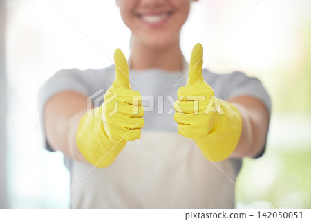 Happy cleaner, hands and thumbs up with gloves for housekeeping, thank you or cleaning service at home. Closeup of person or maid with like emoji, yes sign or ok for review, vote or rating in hygiene 142050051