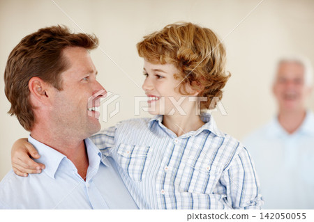 Happy, hug and father and child in home together for bonding, relationship and fun with grandpa. Family, childhood and dad, young boy and grandfather embrace for love, support and relax on weekend Happy, hug and father and child in home together for bonding, relationship and fun with grandpa. Family, childhood and dad, young boy and grandfather embrace for love, support and relax on weekend 142050055