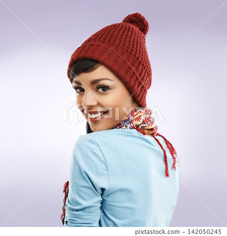 Fashion, woman and portrait in winter, studio with scarf for warm on color background. Accessories, clothing and capsule wardrobe with beanie for cold weather, hat and thrift for happy female model Fashion, woman and portrait in winter, studio with scarf for warm on color background. Accessories, clothing and capsule wardrobe with beanie for cold weather, hat and thrift for happy female model 142050245