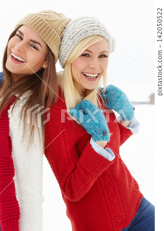 Happy, snow and portrait of girl friends on winter vacation, adventure or holiday for travel. Smile, confident and young women with people for pride and bonding in cold weather for weekend trip Happy, snow and portrait of girl friends on winter vacation, adventure or holiday for travel. Smile, confident and young women with people for pride and bonding in cold weather for weekend trip 142050522