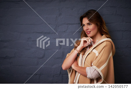 Fashion, beauty and woman with ideas by brick wall with stylish, trendy and elegant outfit. Cosmetic, thinking and female model with classy clothes for style by dark black background with mockup. Fashion, beauty and woman with ideas by brick wall with stylish, trendy and elegant outfit. Cosmetic, thinking and female model with classy clothes for style by dark black background with mockup. 142050577