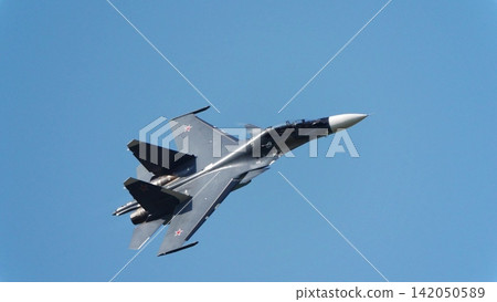 Zhukovsky Russia July 22 2021 Sukhoi Su-30SM fighter jet performing aerobatic maneuvers during the MAKS International Aviation and Space Salon Zhukovsky Russia July 22 2021 Sukhoi Su-30SM fighter jet performing aerobatic maneuvers during the MAKS International Aviation and Space Salon 142050589