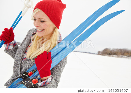Woman, thinking and happy on holiday with ski board for alpine adventure, fun and exploring snowy wilderness. Girl, equipment and outdoor on winter vacation in Michigan for getaway and travel tour. 142051407