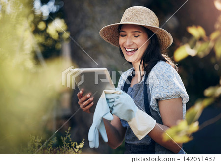 Tablet, gardening and woman checking flowers for botany, growth or development in nature. Botanist, sustainable and florist with digital technology for floral plants in eco friendly environment. Tablet, gardening and woman checking flowers for botany, growth or development in nature. Botanist, sustainable and florist with digital technology for floral plants in eco friendly environment. 142051432
