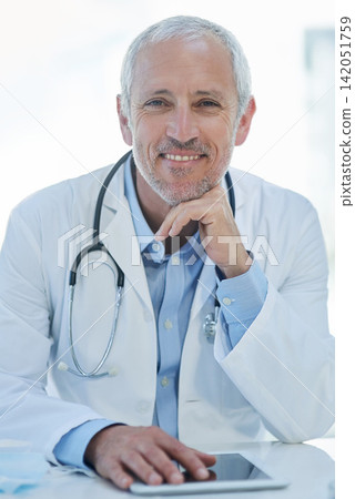 Portrait, happy and mature doctor with tablet in clinic for research, information and treatment. Healthcare, technology and stethoscope in hospital for connection, medical care and smile in office 142051759