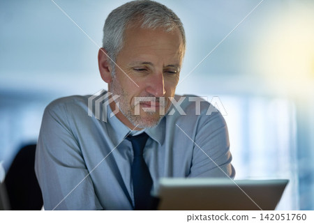 Business, mature and man with tablet in office by desk as director for research or information on project growth. Formal, male boss and digital technology on website for ideas of company development 142051760