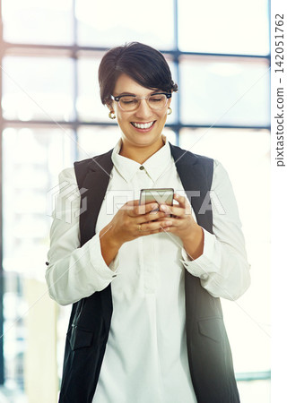 Office, business and woman and typing on smartphone, web search and internet browsing or mobile connection. Communication, technology and smile online or happy for notification, text and professional Office, business and woman and typing on smartphone, web search and internet browsing or mobile connection. Communication, technology and smile online or happy for notification, text and professional 142051762