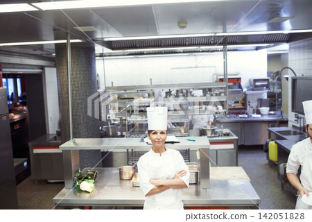 Chef, woman and confident in industrial kitchen, restaurant and gourmet meal prep and serving. Crossed arms, catering service and culinary skills, nutrition and working in hospitality industry Chef, woman and confident in industrial kitchen, restaurant and gourmet meal prep and serving. Crossed arms, catering service and culinary skills, nutrition and working in hospitality industry 142051828