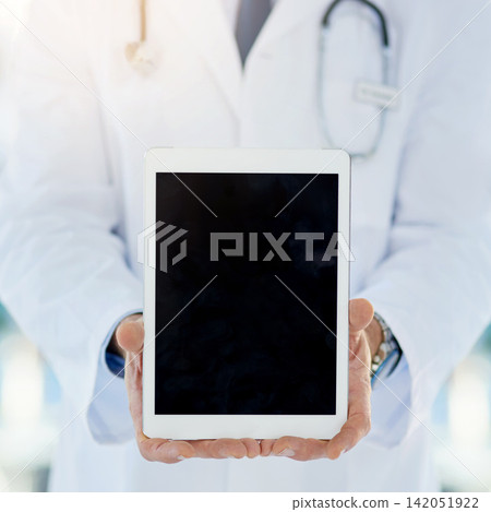 Hands, mockup and doctor with tablet in hospital for medical research with diagnosis or treatment. Career, professional and healthcare worker with digital technology for blank screen in clinic. Hands, mockup and doctor with tablet in hospital for medical research with diagnosis or treatment. Career, professional and healthcare worker with digital technology for blank screen in clinic. 142051922
