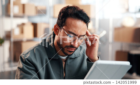 Thinking, man and logistics worker with tablet in office with mistake on inventory or online order. Error, cargo service and supply chain manager with digital technology for delivery information. 142051999