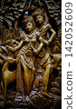 Ornate Wooden Carving of Mythological Couple Relief Sculpture Showing Balinese Handcrafted Detail 142052609