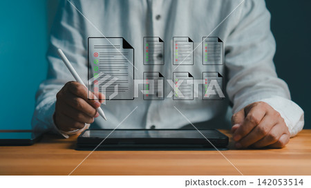 Professional man uses a digital pen for an online signature on a smart form. This modern technology provides paperless management of a business document and contract approval. Professional man uses a digital pen for an online signature on a smart form. This modern technology provides paperless management of a business document and contract approval. 142053514