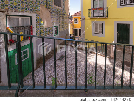 Traditional Courtyard and Colorful Houses in Alfama, Lisbon, Portugal Traditional Courtyard and Colorful Houses in Alfama, Lisbon, Portugal 142054258