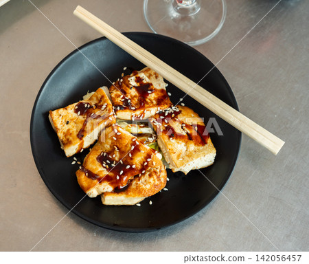 Chinese salad of stewed vegetables and tofu cheese. Chinese salad of stewed vegetables and tofu cheese. 142056457