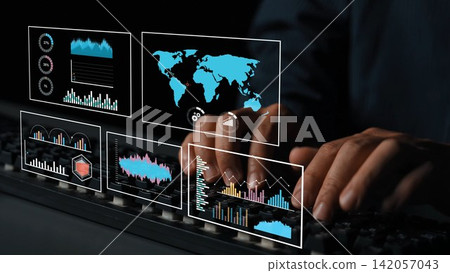 Hands typing on keyboard with digital screens showing analytics, graphs, and global maps in a dark environment emphasizing technology and data visualization Gluon Hands typing on keyboard with digital screens showing analytics, graphs, and global maps in a dark environment emphasizing technology and data visualization Gluon 142057043