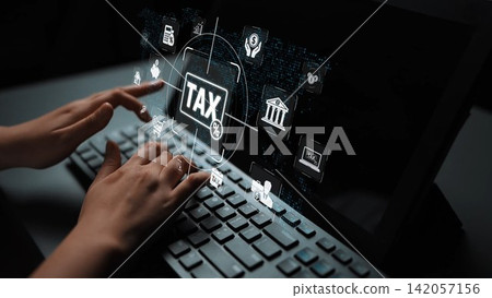 A close-up of hands typing on a keyboard while interacting with digital tax icons. This image showcases modern online tax filing concepts and financial management tools. Sigmoid A close-up of hands typing on a keyboard while interacting with digital tax icons. This image showcases modern online tax filing concepts and financial management tools. Sigmoid 142057156