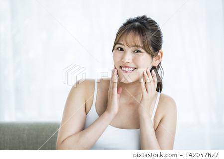 Young woman beauty skin care smile Young woman beauty skin care smile 142057622