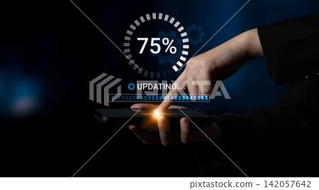 Hand Touching Smartphone Screen Showing Progress Bar and Update Notification with 75 Percent Completion on Dark Background. Entropy 142057642