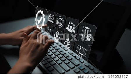 Hands Typing on Keyboard with Overlay Icons Representing Digital Workflow, Business Strategy, and Project Management in Office Environment Sigmoid. Hands Typing on Keyboard with Overlay Icons Representing Digital Workflow, Business Strategy, and Project Management in Office Environment Sigmoid. 142058527