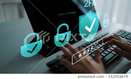 Secure Authentication with Two-Factor Verification Symbols Displayed on Computer Screen while User Types Password on Keyboard in Modern Office Setting Gluon Secure Authentication with Two-Factor Verification Symbols Displayed on Computer Screen while User Types Password on Keyboard in Modern Office Setting Gluon 142058674