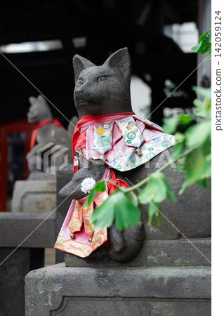 Asakusa Shrine: Stone statues of a fox and its cub enshrined within the shrine grounds (Inari shrine, lucky charm, tradition) Asakusa Shrine: Stone statues of a fox and its cub enshrined within the shrine grounds (Inari shrine, lucky charm, tradition) 142059124