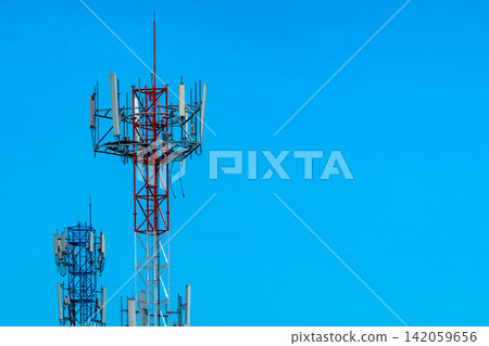 Telecommunication tower with blue sky and white clouds background. Antenna on blue sky. Radio and satellite pole. Communication technology. Telecommunication industry. Mobile or telecom 4g network. 142059656