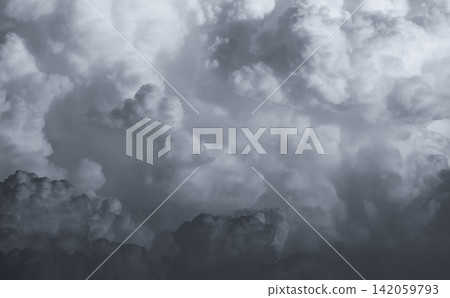 Towering cumulonimbus storm cloud with dramatic atmospheric texture and layered formations, illustrating powerful weather conditions, climate science and natural cloudscape background. Towering cumulonimbus storm cloud with dramatic atmospheric texture and layered formations, illustrating powerful weather conditions, climate science and natural cloudscape background. 142059793
