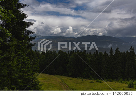 Scenery of mountains and valleys in the Carpathians, Ukraine during summer Scenery of mountains and valleys in the Carpathians, Ukraine during summer 142060035