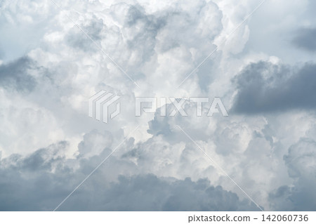 White fluffy clouds on cloudy sky. Soft touch feeling like cotton. White puffy cloudscape. Beauty in nature. Close-up white clouds texture background. Pure nature. White background for minimal pattern White fluffy clouds on cloudy sky. Soft touch feeling like cotton. White puffy cloudscape. Beauty in nature. Close-up white clouds texture background. Pure nature. White background for minimal pattern 142060736