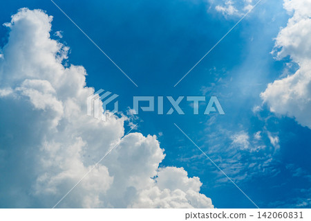 Beautiful blue sky and white cumulus clouds abstract background. Cloudscape background. Blue sky and fluffy white clouds on sunny day. Nature weather. Bright day sky for happy day background. Beautiful blue sky and white cumulus clouds abstract background. Cloudscape background. Blue sky and fluffy white clouds on sunny day. Nature weather. Bright day sky for happy day background. 142060831
