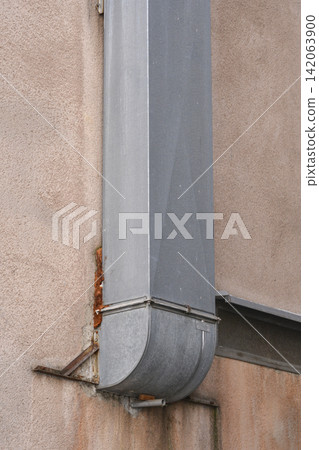 ndustrial metal ventilation duct on building wall ndustrial metal ventilation duct on building wall 142063900
