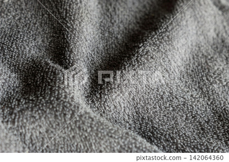Dark Grey Microfiber Fabric Texture Background with Soft Waves Dark Grey Microfiber Fabric Texture Background with Soft Waves 142064360