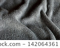 Dark Grey Microfiber Fabric Texture Background with Soft Waves 142064361