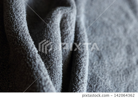 Dark Grey Microfiber Fabric Texture Background with Soft Waves Dark Grey Microfiber Fabric Texture Background with Soft Waves 142064362