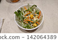 Salad with dressing 142064389