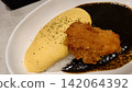 Omelet curry topped with fried chicken 142064392