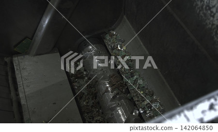 Environmental Sustainability Achieved Through Industrial Shredding Of Circuit Components In Factory Settings. Media Environmental Sustainability Achieved Through Industrial Shredding Of Circuit Components In Factory Settings. Media 142064850