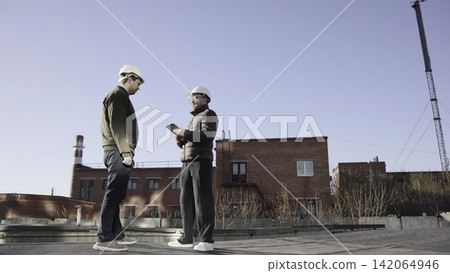 Site Planning Discussion. Construction Team Discusses Safety Measures And Project Timelines Thoroughly . Media Site Planning Discussion. Construction Team Discusses Safety Measures And Project Timelines Thoroughly . Media 142064946