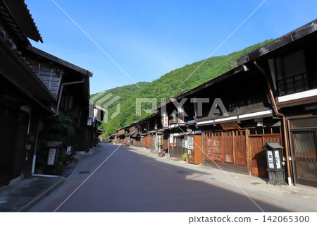 Nagano, Shiojiri, Narai-juku: An old townscape in a designated Important Preservation District for Groups of Traditional Buildings. Nagano, Shiojiri, Narai-juku: An old townscape in a designated Important Preservation District for Groups of Traditional Buildings. 142065300