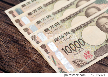 Japanese yen banknotes worth 50,000 yen Japanese yen banknotes worth 50,000 yen 142065321