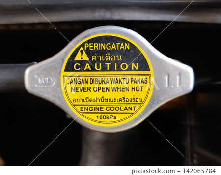 radiator water tank cap on a car. radiator water tank cap on a car. 142065784