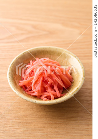 Pickled ginger served on a small plate Pickled ginger served on a small plate 142066635